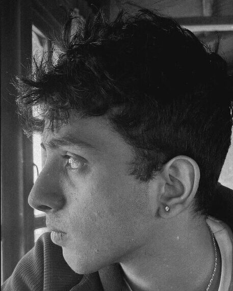 Profile portrait in hard black and white